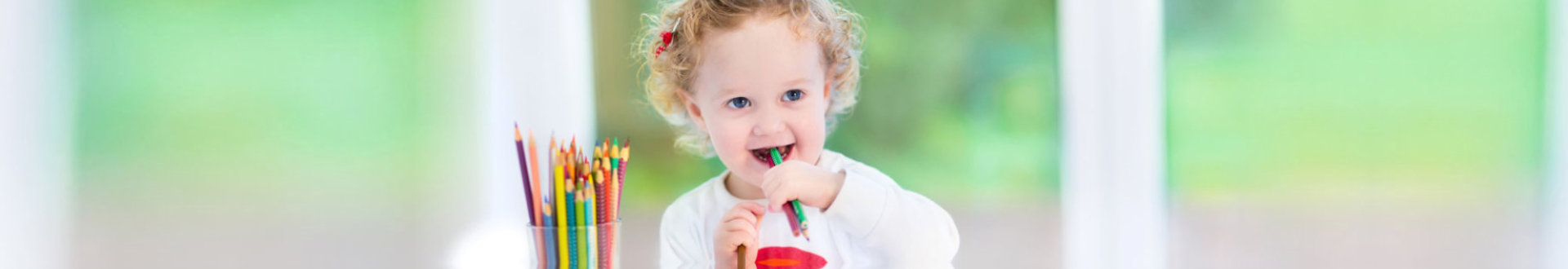 child eating pencil